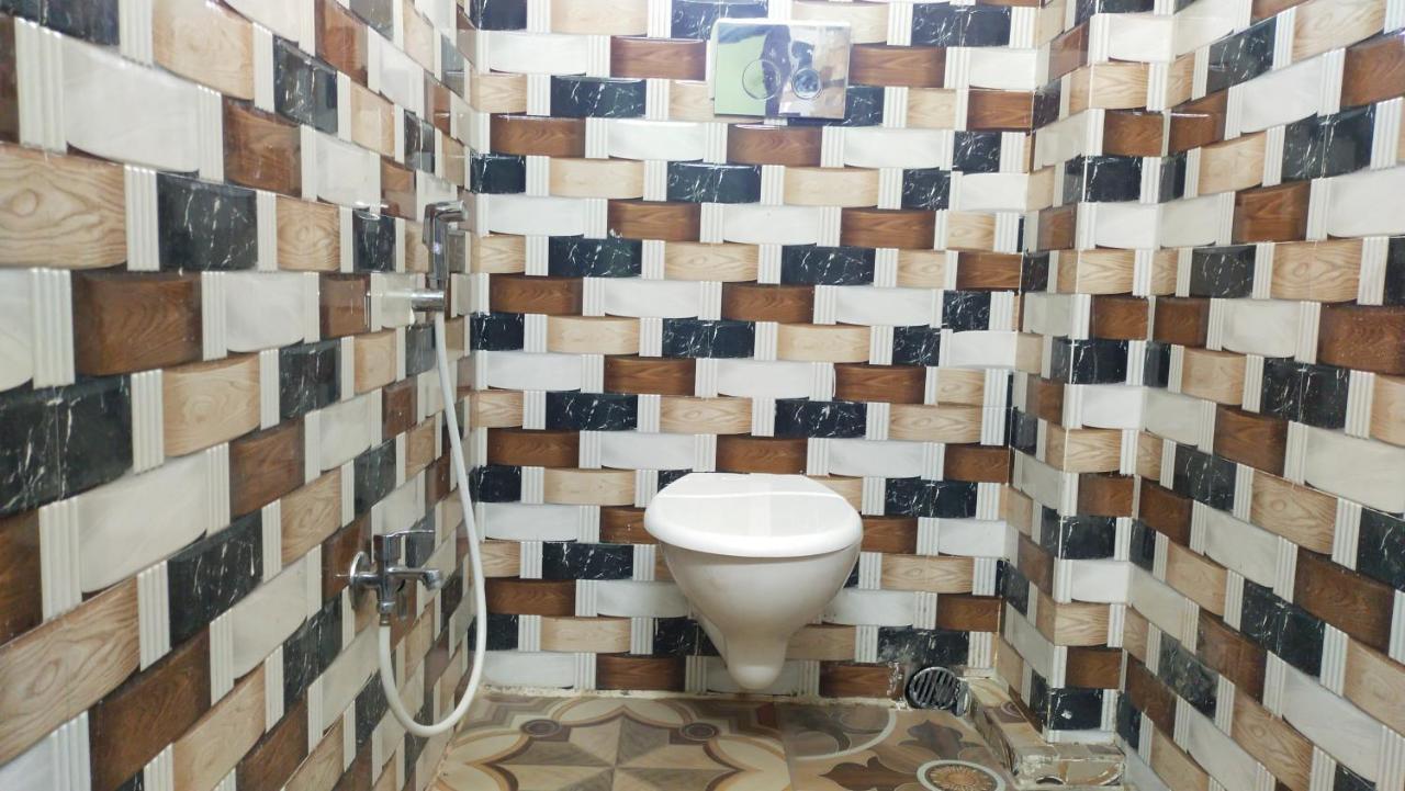 Oyo Hotel Tulusi Inn โบลปูร์ ภายนอก รูปภาพ
